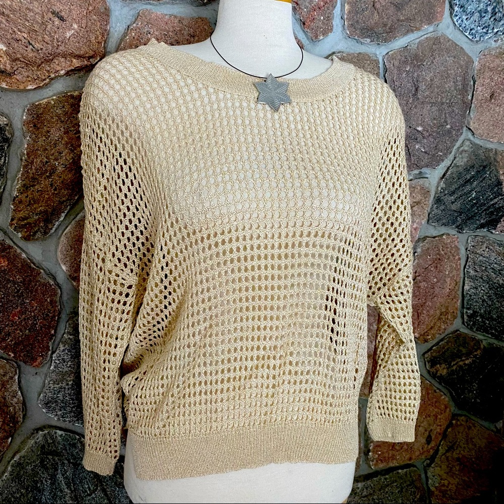 Pretty gold tone loose knit sweater